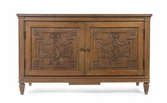 Appraisal: A Neoclassical Style Pine Console Cabinet having a rectangular top