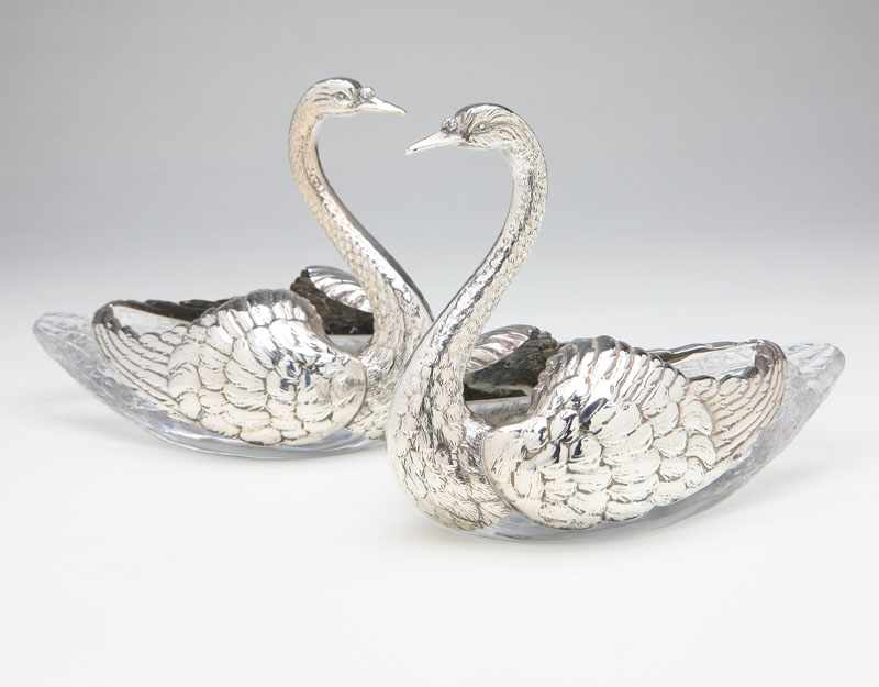 Appraisal: A pair of Durgin sterling silver and pressed glass swan-form