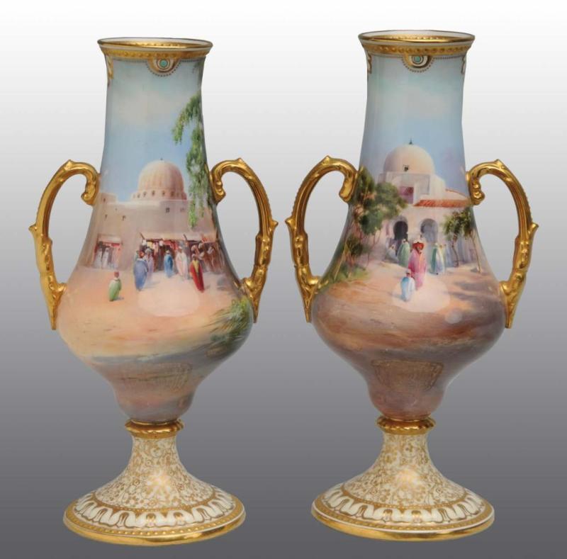 Appraisal: Pair of Porcelain Royal Doulton Vases Description Both have Arabian