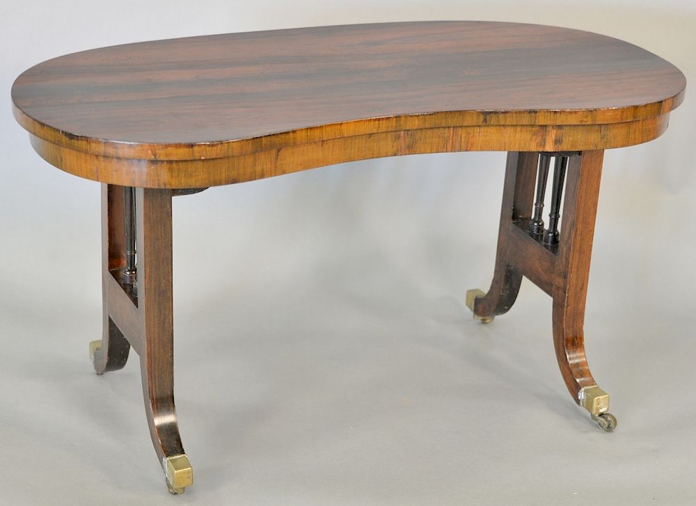 Appraisal: Regency rosewood low table th century kidney form top on