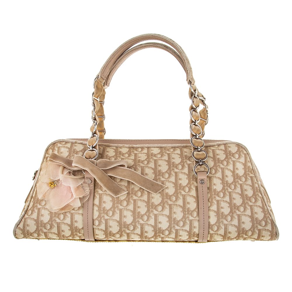 Appraisal: A Christian Dior Romantique Trotter Bag A beige and pink