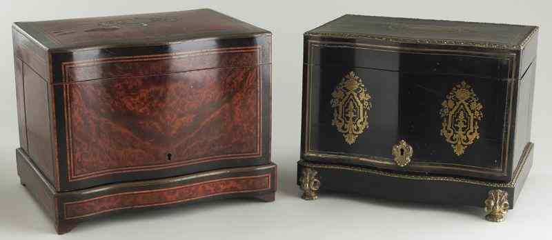 Appraisal: French cave a liqueur ebonized case with brass inlay enclosing