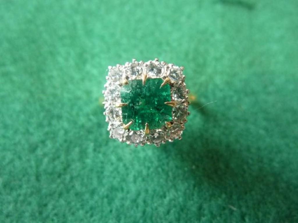 Appraisal: An emerald and diamond-set cluster ring