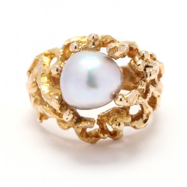 Appraisal: GOLD AND PEARL RING Designed in a naturalistic coral motif