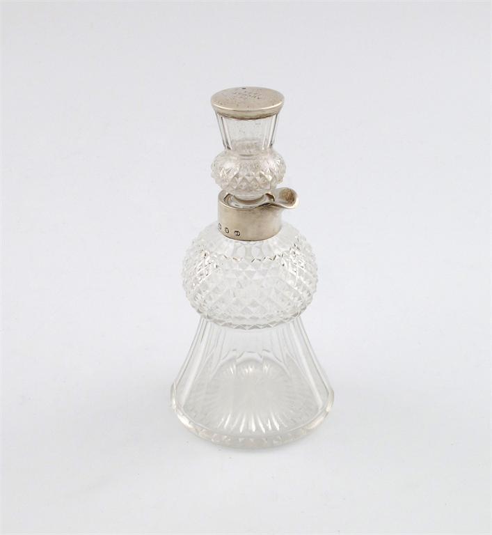 Appraisal: A late-Victorian silver mounted cut-glass whisky tot