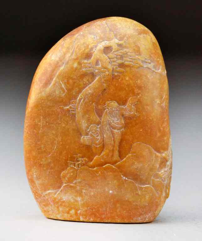 Appraisal: Chinese Tianhuang Stone BoulderFinely carved to depict a scholar under