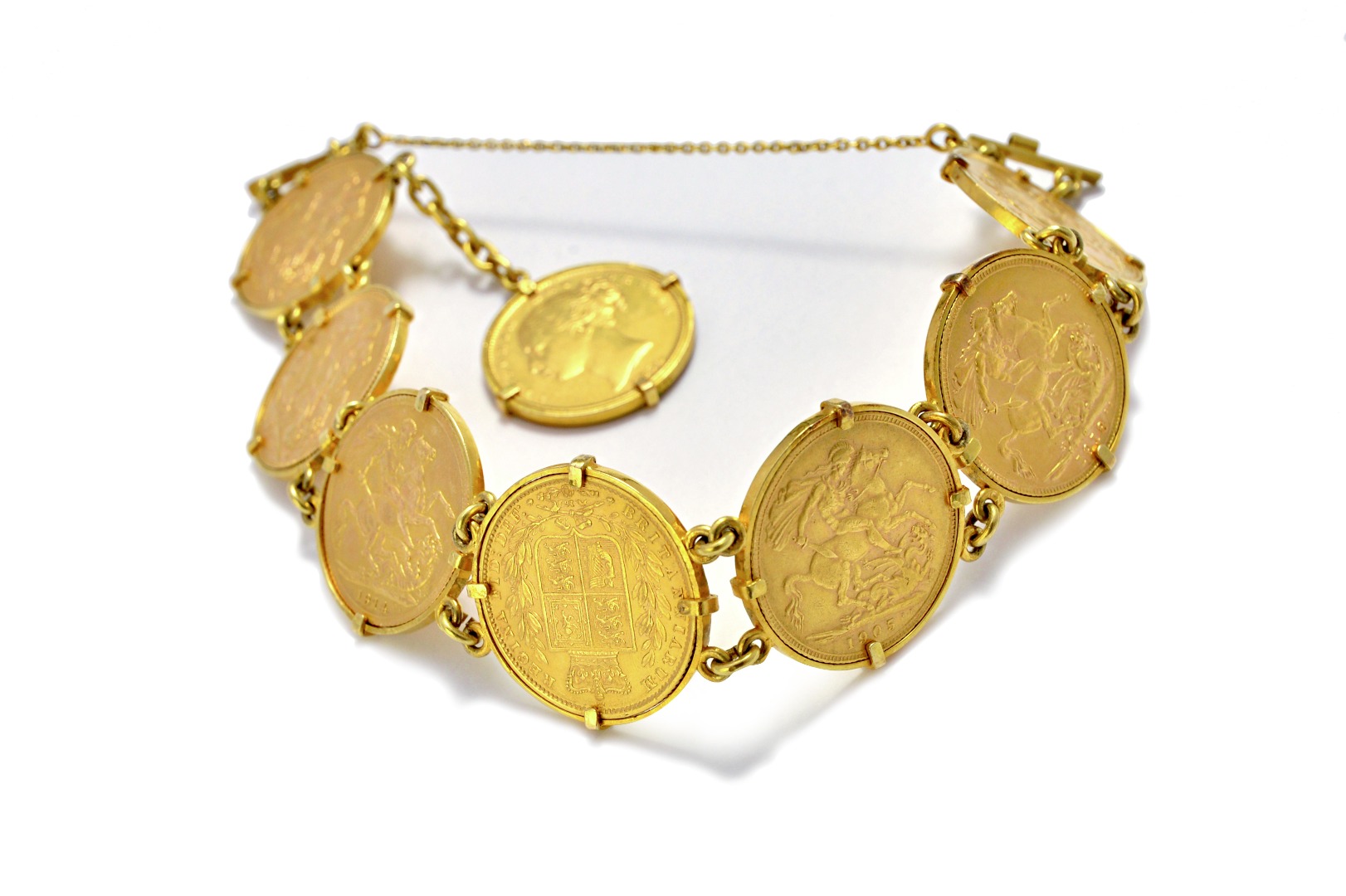 Appraisal: A gold bracelet mounted with eight sovereigns including Victoria young