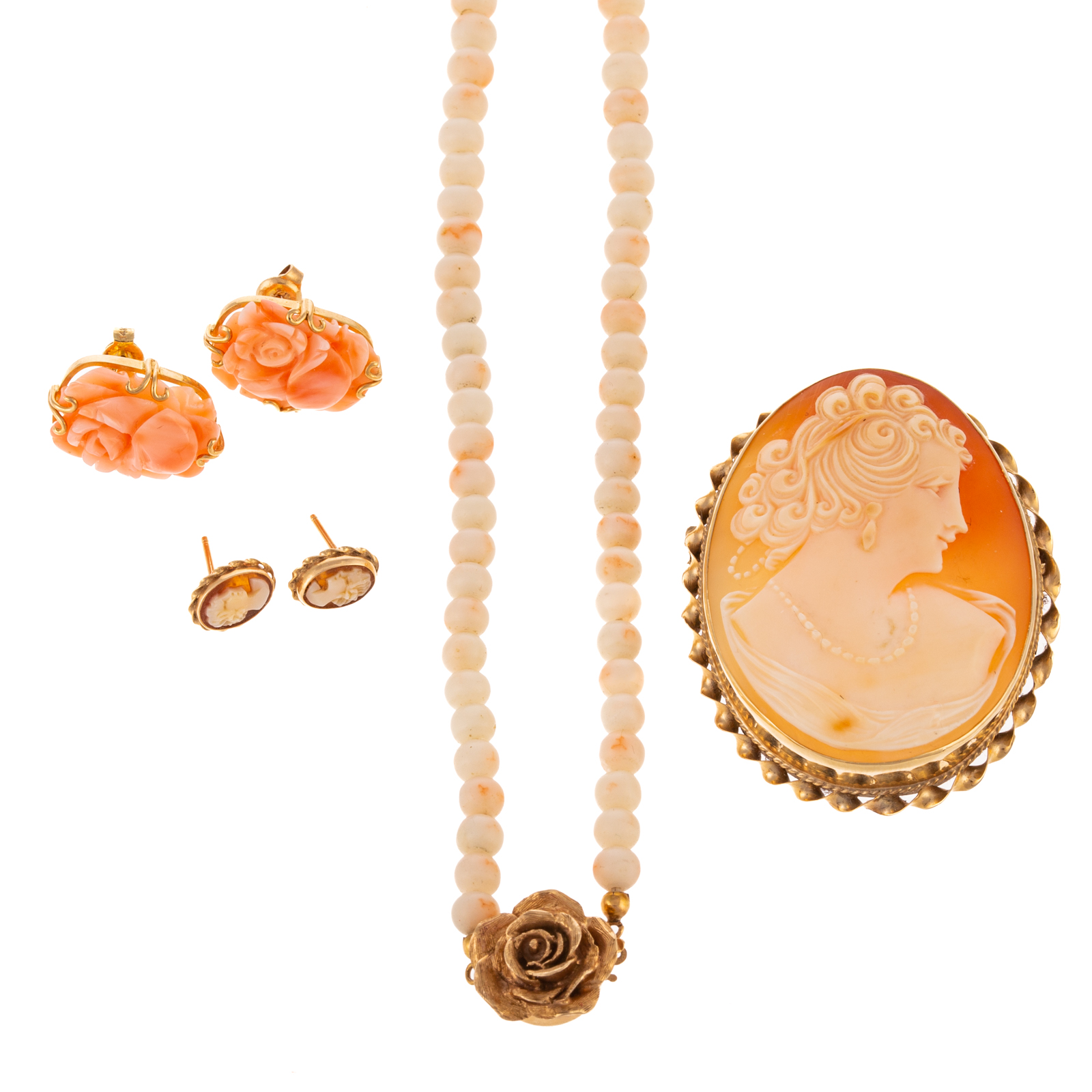 Appraisal: A COLLECTION OF CORAL CAMEO JEWELRY K yellow gold oval