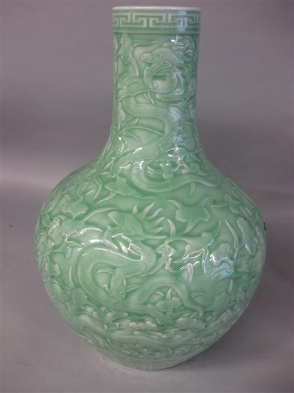 Appraisal: Large Chinese carved and celadon glazed 'dragon vase qianlong mark