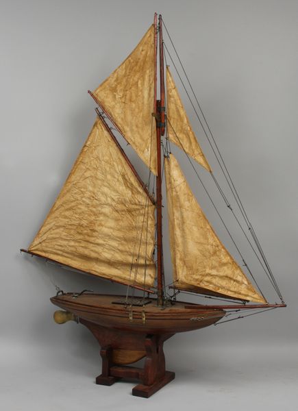 Appraisal: Varnished early th century pond yacht with ballasted keel Brass