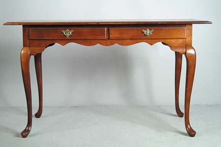 Appraisal: CHERRY TWO DRAWER MODERN TABLE Queen Anne style by Broyhill