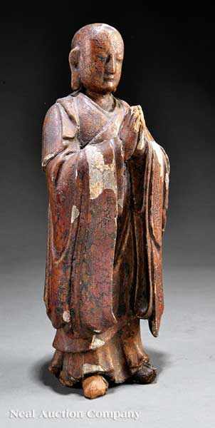 Appraisal: A Chinese Polychromed and Gessoed Carved Wood Figure of a