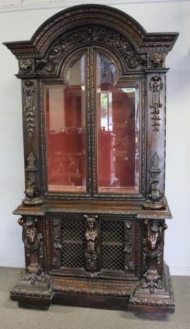 Appraisal: Impressive th Century Carved Cabinet With figures lions heads and