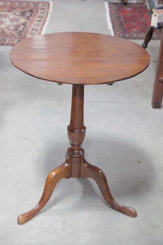 Appraisal: TILT TOP CANDLE STAND Walnut having a round top wrought