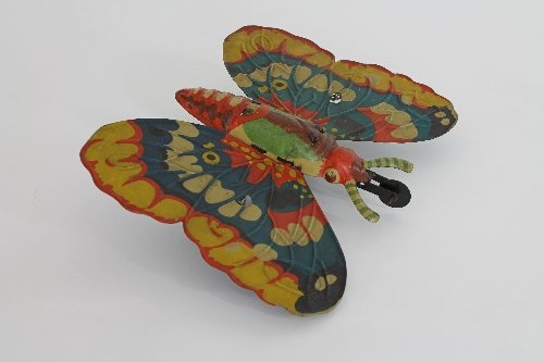 Appraisal: A German clockwork butterfly circa with painted and decorated body