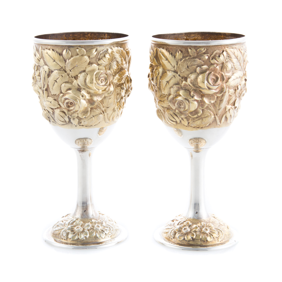 Appraisal: Pr Stieff Rose gold washed repousse silver goblets Beautiful pair