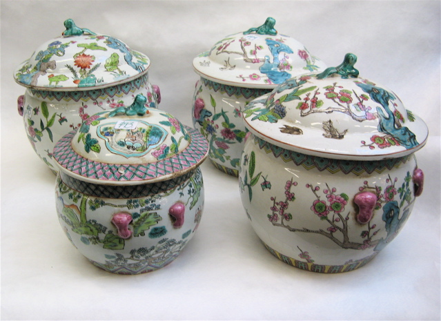 Appraisal: FOUR CHINESE GLAZED POTTERY COVERED JARS with colorful floral and