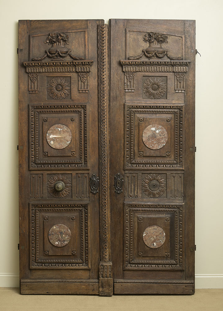 Appraisal: PAIR OF LOUIS XVI CARVED OAK DOORS With later inset