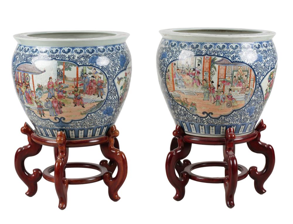 Appraisal: PAIR OF CHINESE PORCELAIN FISH BOWL PLANTERSunsigned on wooden stands