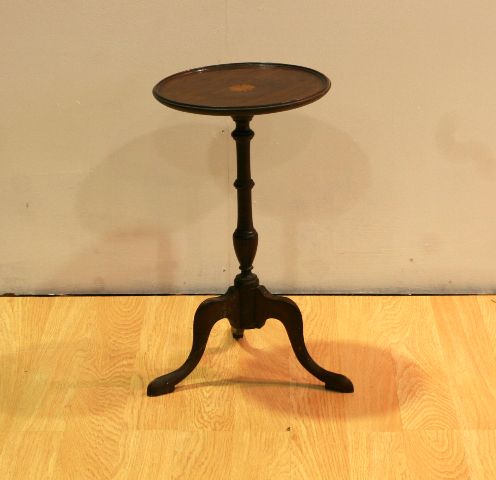 Appraisal: A reproduction mahogany wine table cm diameter cm high