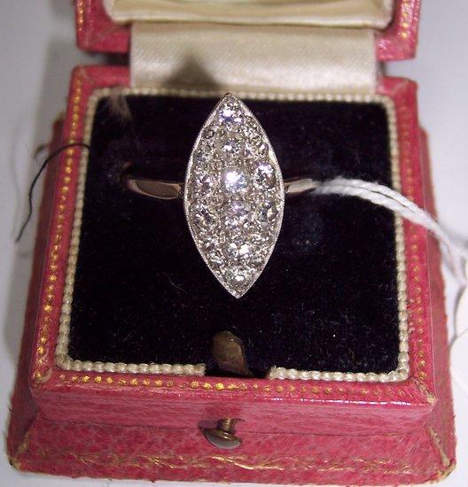 Appraisal: A diamond cluster ring of marquise shape pav set with