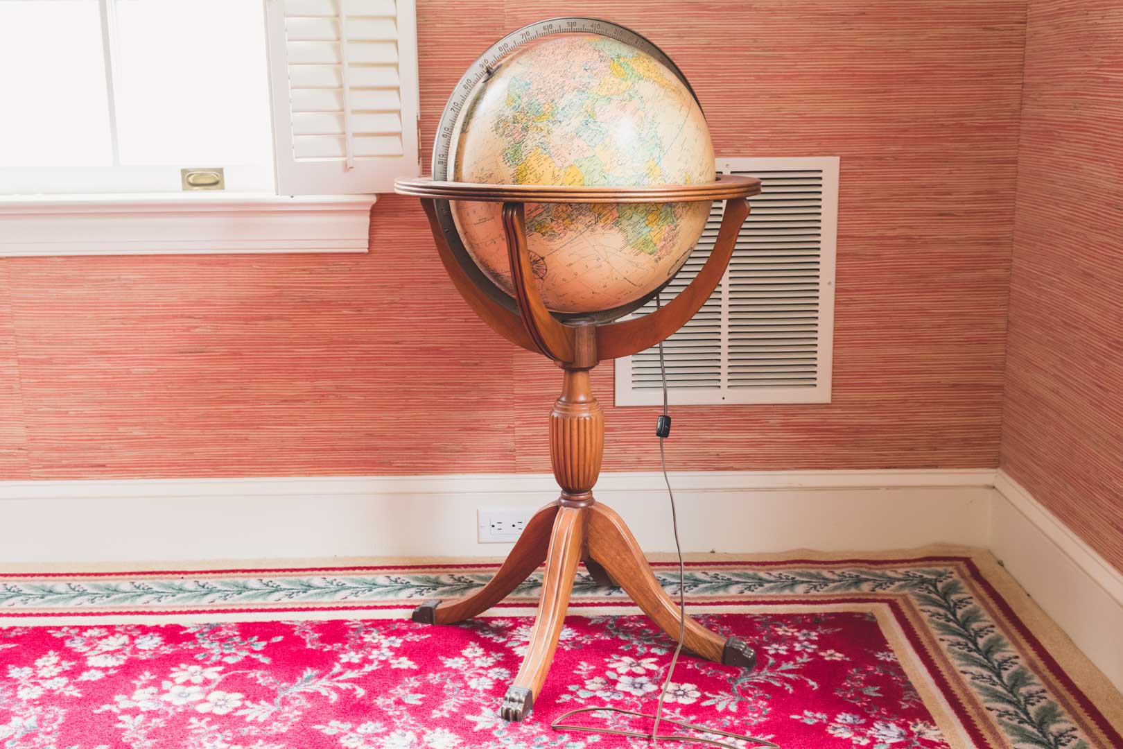 Appraisal: Replogle illuminated terrestrial globe on mahogany stand in H in