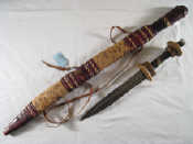 Appraisal: Tribal Art A Touareg sword in decorated leather scabbard cm