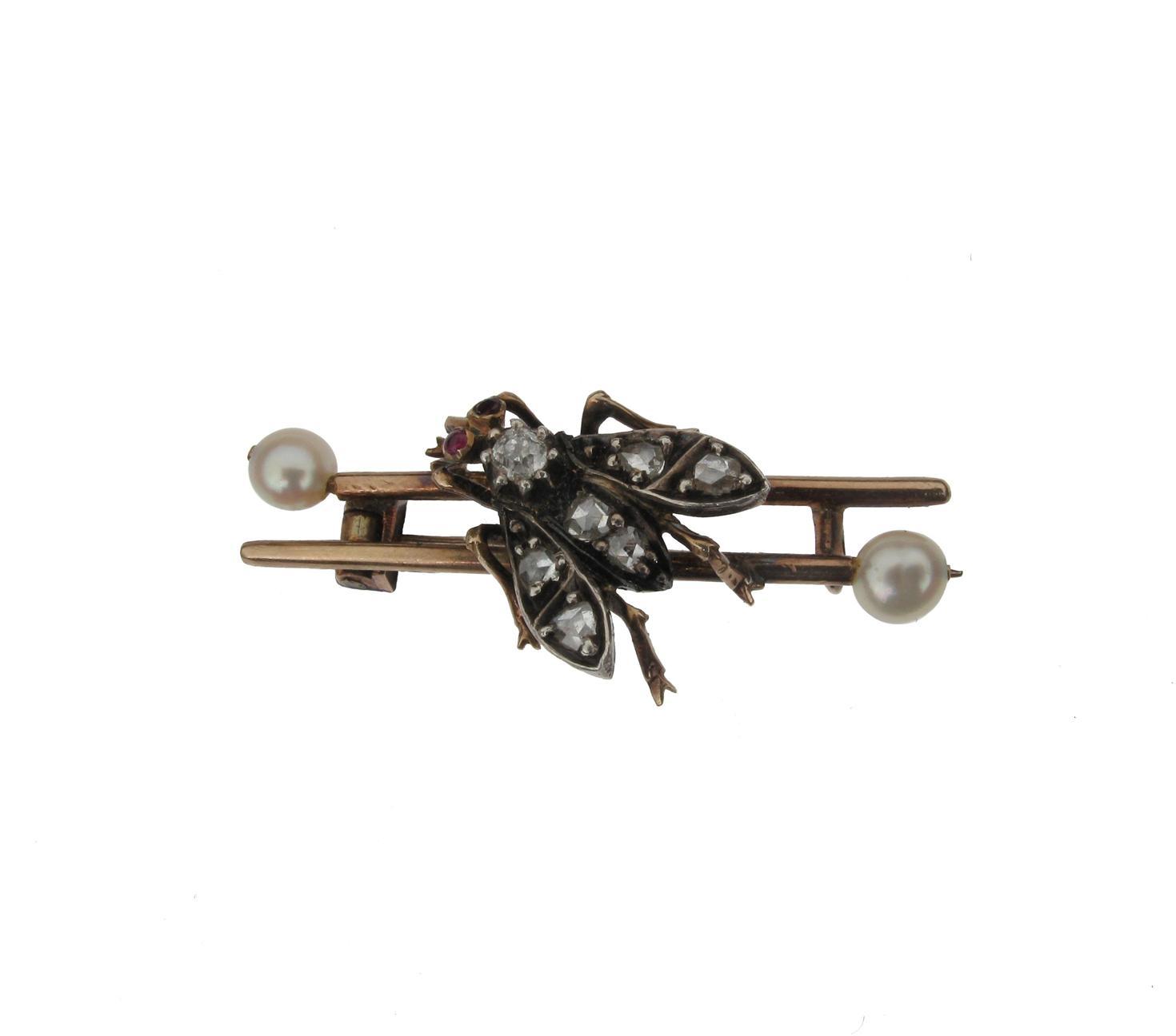 Appraisal: A gold bar brooch with pearl terminals