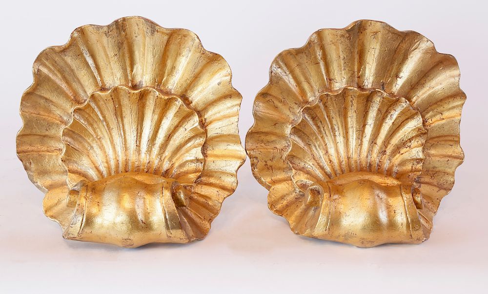 Appraisal: Pair of Gilt Composition Scallop Shell Motif Ornaments Exclusive on