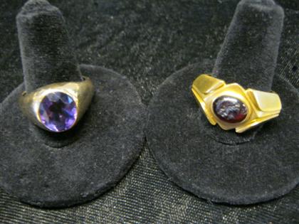 Appraisal: Two gentleman's yellow gold ringsOne karat yellow gold amethyst set