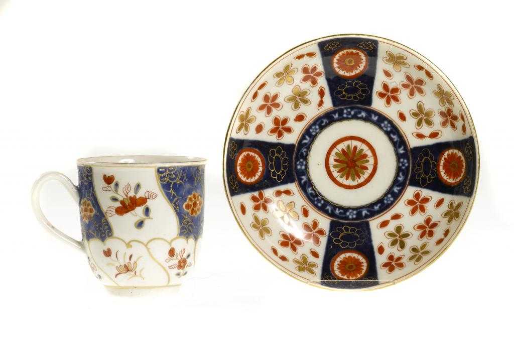 Appraisal: A WORCESTER COFFEE CUP AND A SAUCER enamelled with the