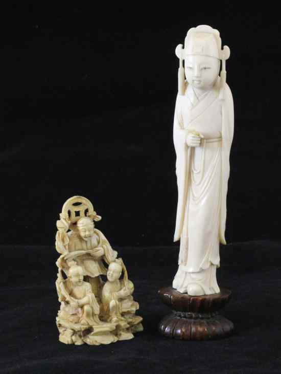 Appraisal: A Chinese ivory group of an immortal and two attendants