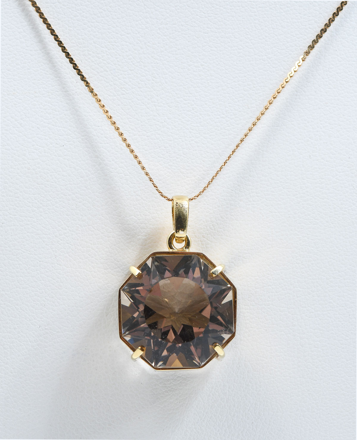 Appraisal: K SMOKY QUARTZ PENDANT K yellow gold pendant contains one