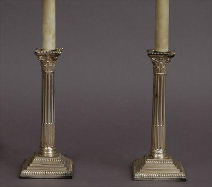 Appraisal: PAIR OF ENGLISH SILVER-PLATED CORINTHIAN COLUMN-FORM TABLE LAMPS Retailed by