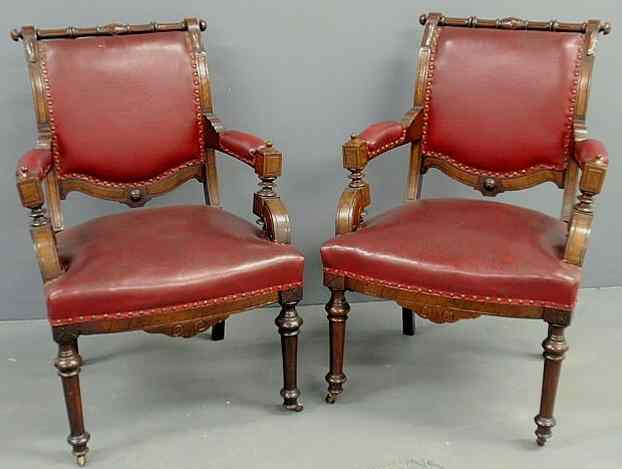 Appraisal: Pair of Lejambre Philadelphia walnut open armchairs with red leather