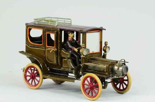 Appraisal: CARETTE LIMOUSINE Germany c - lithographed tin clockwork example done