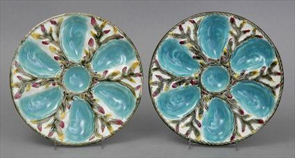 Appraisal: PAIR OF MAJOLICA TURQUOISE-GROUND OYSTER PLATES Unmarked each recess spaced