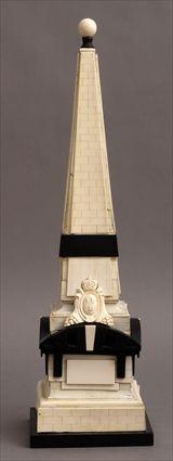 Appraisal: BAROQUE-STYLE IVORY AND EBONY OBELISK The flared shaft beneath ball