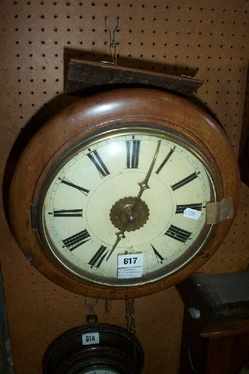 Appraisal: A th century postman's alarm wall clock with timber dial