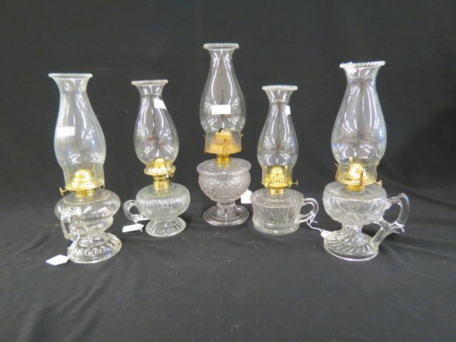 Appraisal: Victorian Oil Lamps all finger or chamberstick models with burners