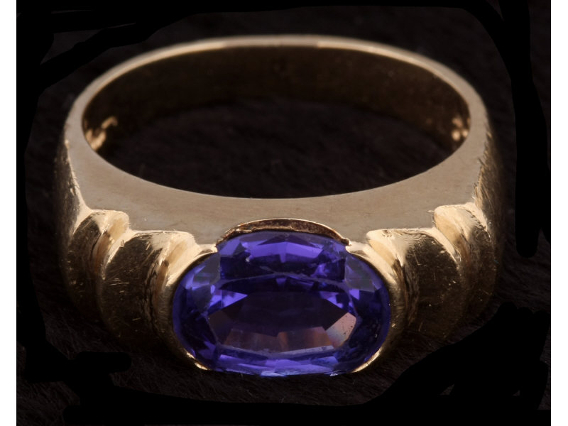 Appraisal: k Yellow Gold Tanzanite Ring featuring one oval tanzanite set