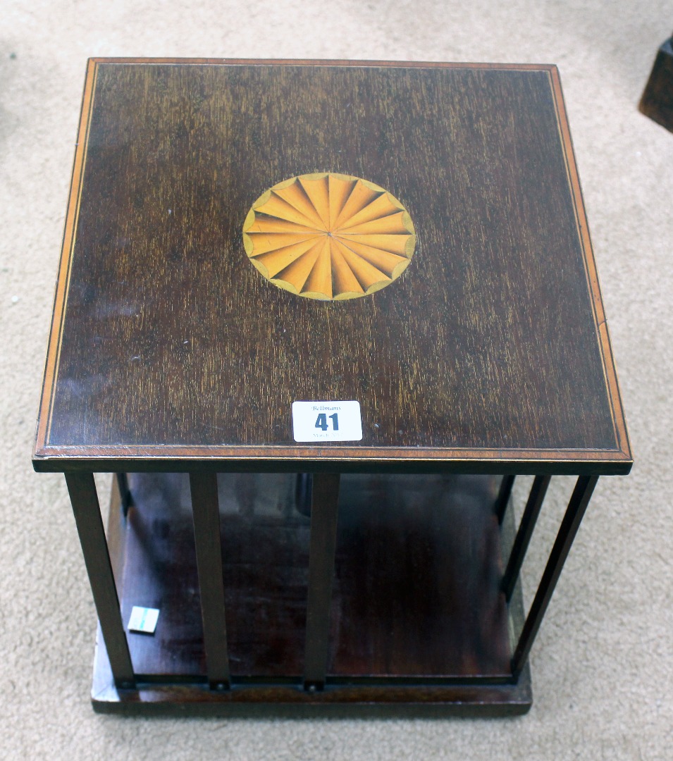 Appraisal: An Edwardian mahogany satinwood crossbanded square table top revolving bookcase