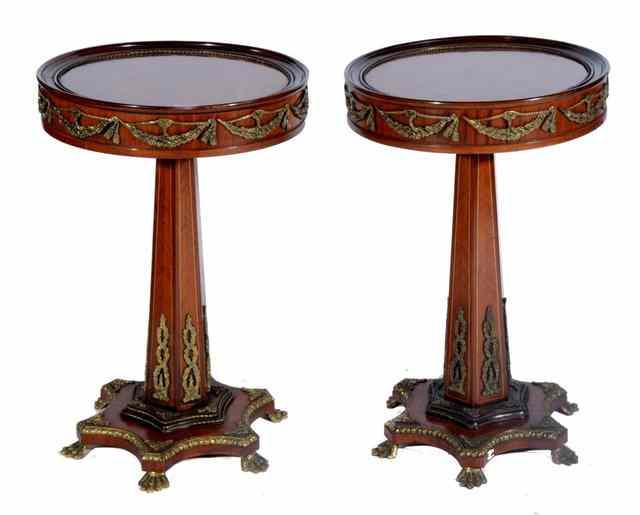 Appraisal: A PAIR OF REPRODUCTION CIRCULAR PEDESTAL TABLES each with geometric