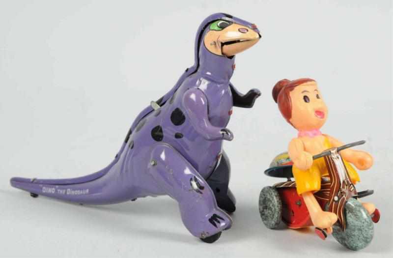 Appraisal: Lot of Tin Flintstones Wind-Up Toy Both toys marked Hanna-Barbera