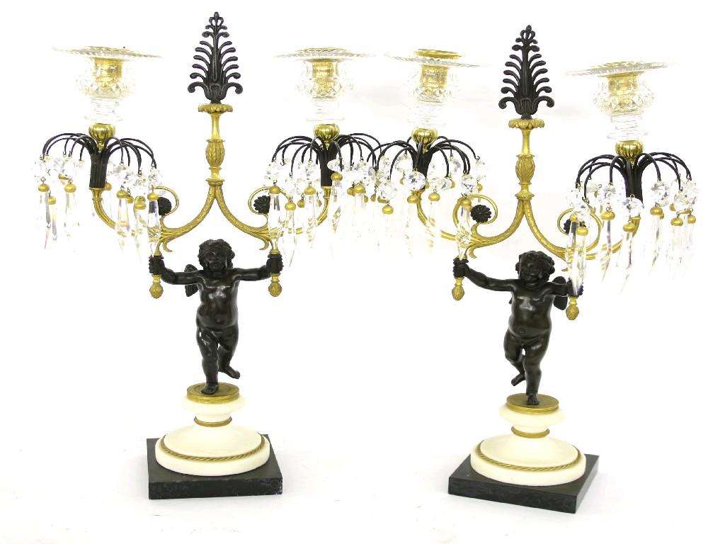 Appraisal: Good pair of Regency style bronze and ormolu two branch