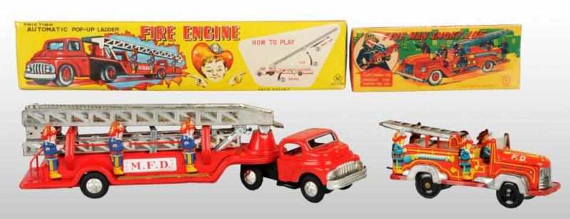 Appraisal: Lot of Tin Fire Engine Friction Toys Description Japanese Working