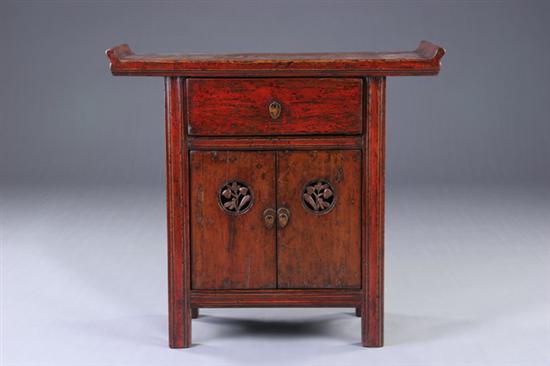 Appraisal: CHINESE RED LACQUERED WALNUT LOW CABINET th century Shanxi province