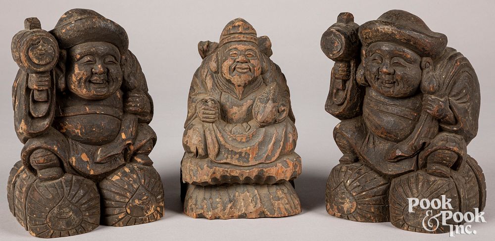 Appraisal: Three Japanese carved wood figures Three Japanese carved wood figures