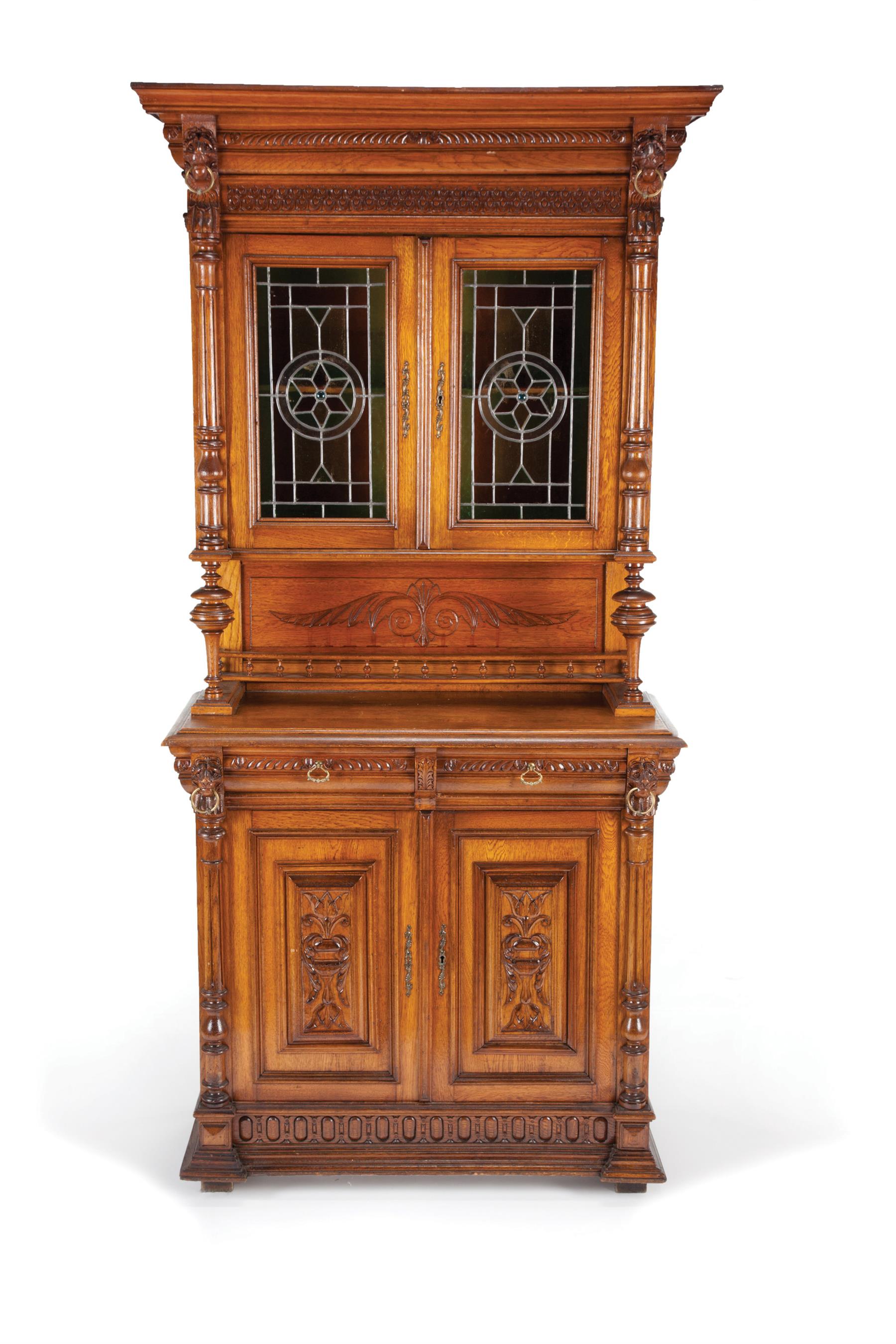 Appraisal: EUROPEAN COURT CUPBOARD Late th-early th century oak Two-piece cupboard