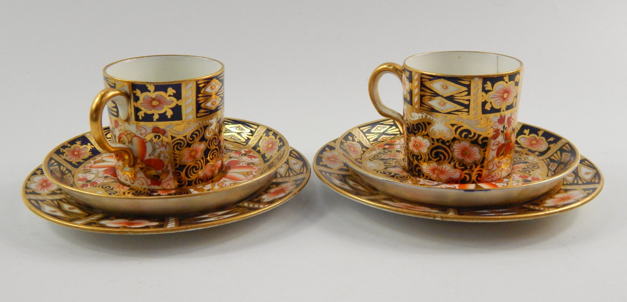 Appraisal: A pair of Royal Crown Derby imari porcelain coffee can